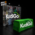 Curved pop-up fabric display table with green printed cover and rounded corners