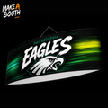 Ellipse hanging banner with green and white eagle graphic and bold EAGLES text
