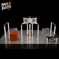 Octopus booth display setup with arched frames, counters, and branded sign panels